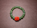 Green Jade Bead Bracelet with Red Coral Accent
