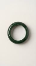 Green nephrite jade dome ring with gold-plated band