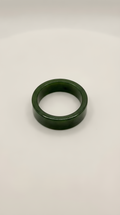 Green nephrite jade flat band ring with smooth finish