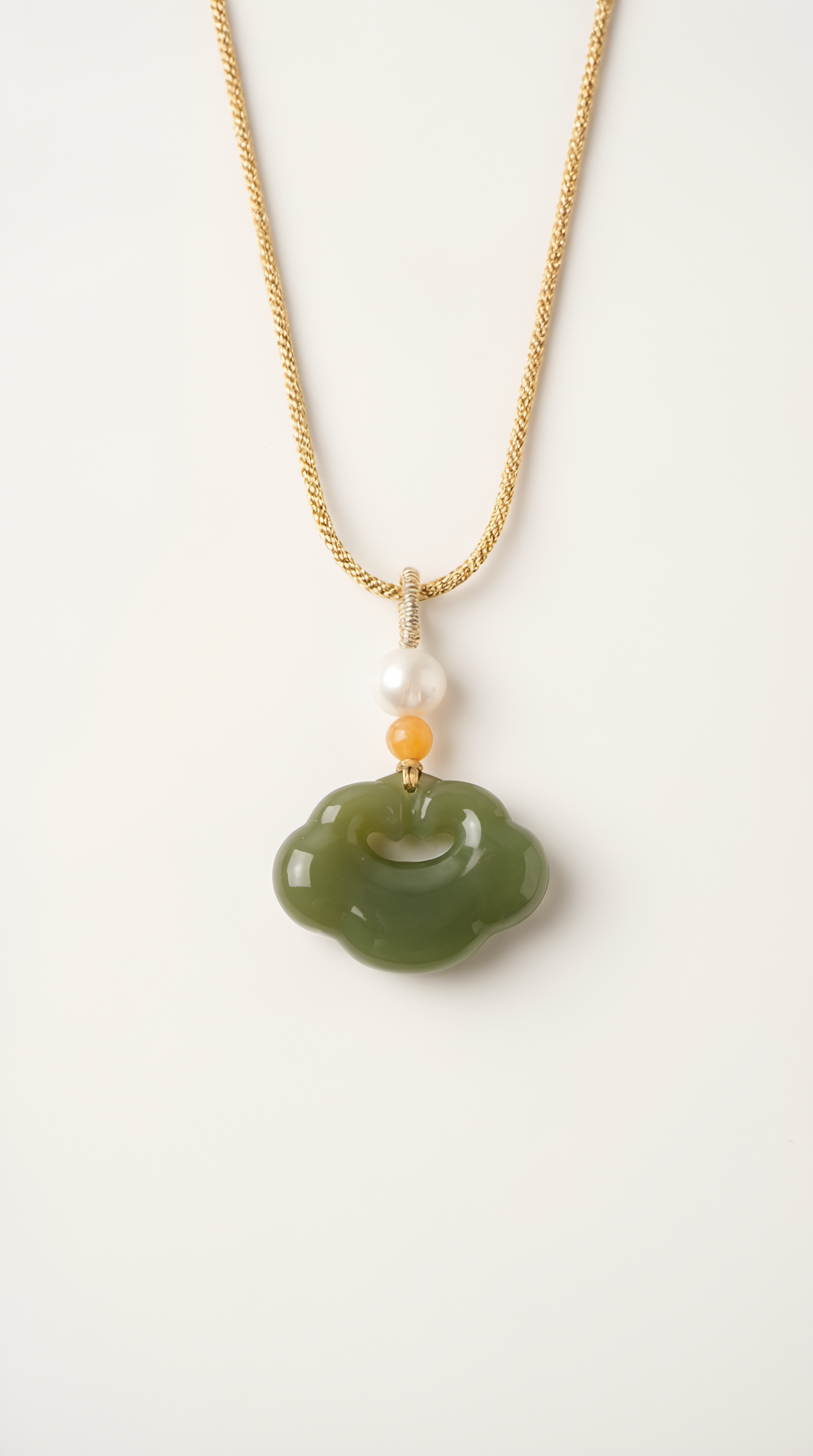 Jade ruyi lock pendant necklace with gold setting on chain