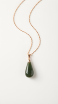 Green nephrite jade teardrop pendant necklace on gold chain
