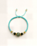 Laguna pairs nephrite jade beads with small agate beads at the sides.