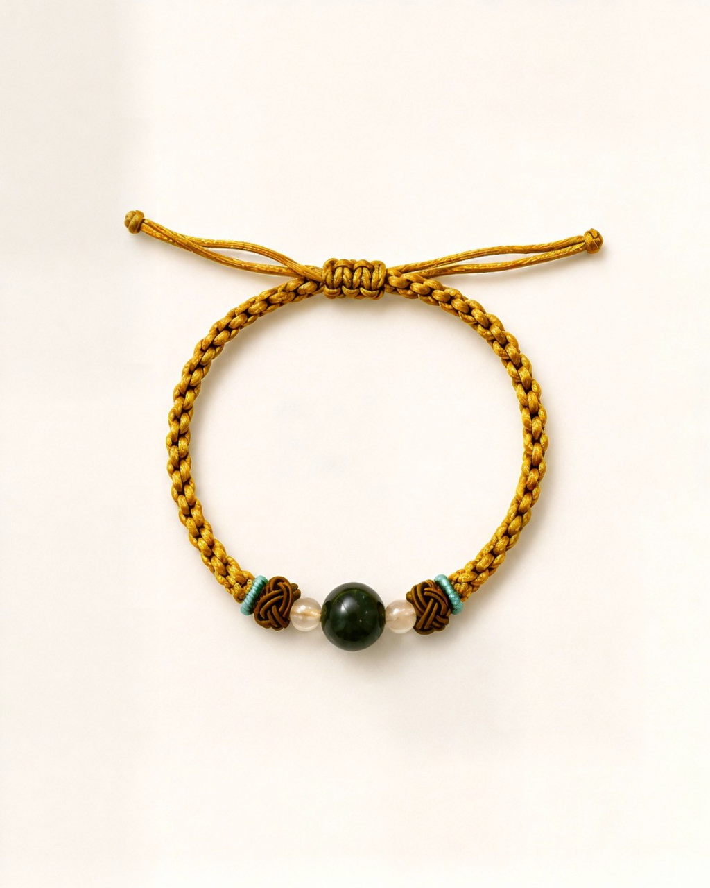 Solana combines a green nephrite jade centre bead with two small agate beads.