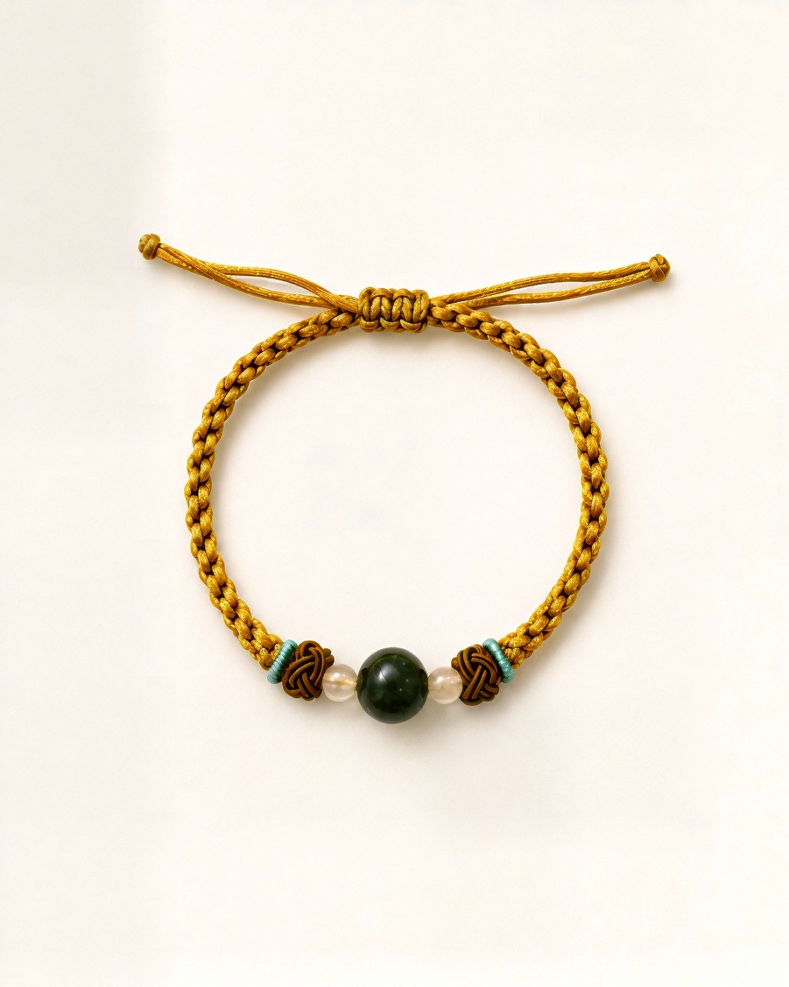 Solana combines a green nephrite jade centre bead with two small agate beads.