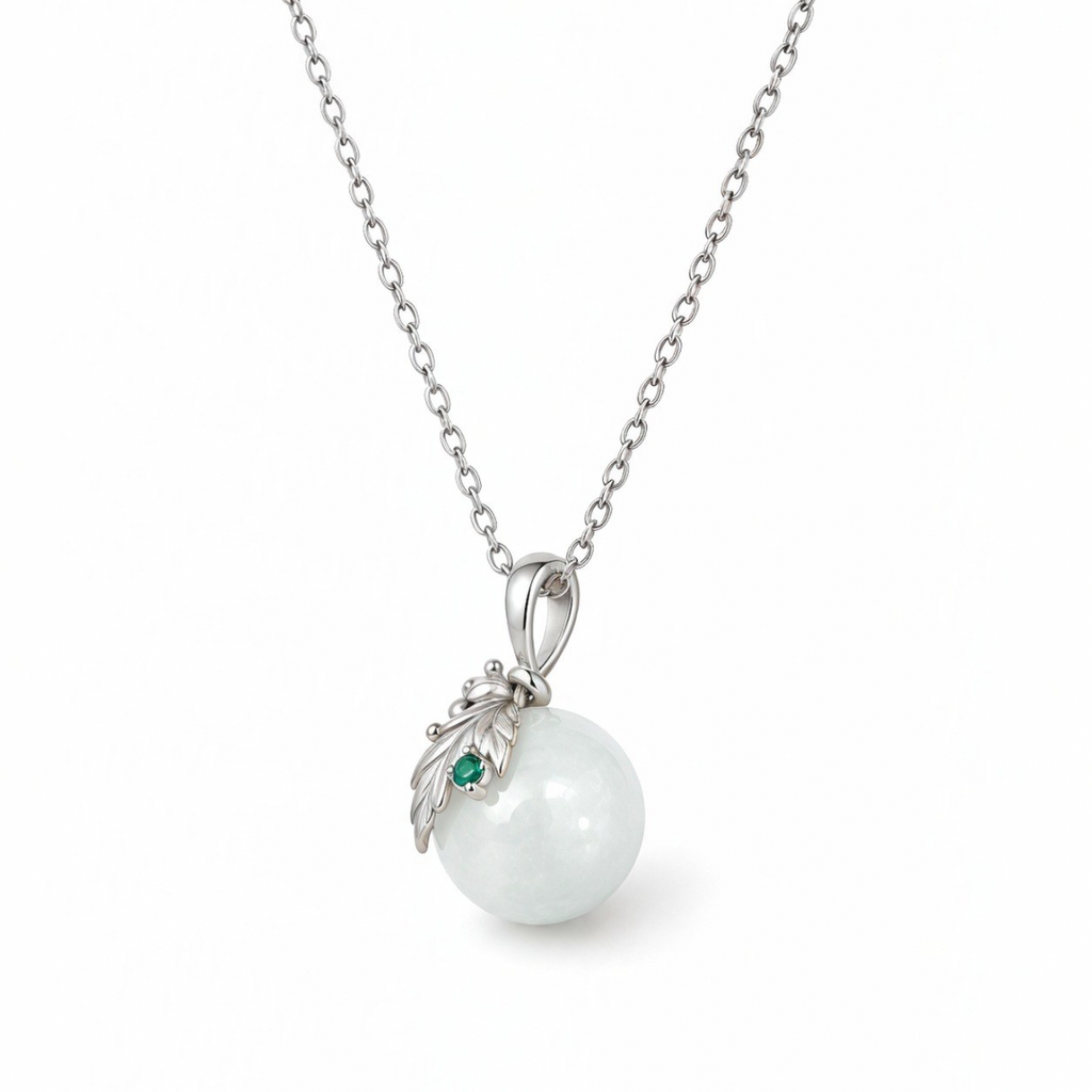 Side view of the Flora pendant with a white nephrite jade sphere.