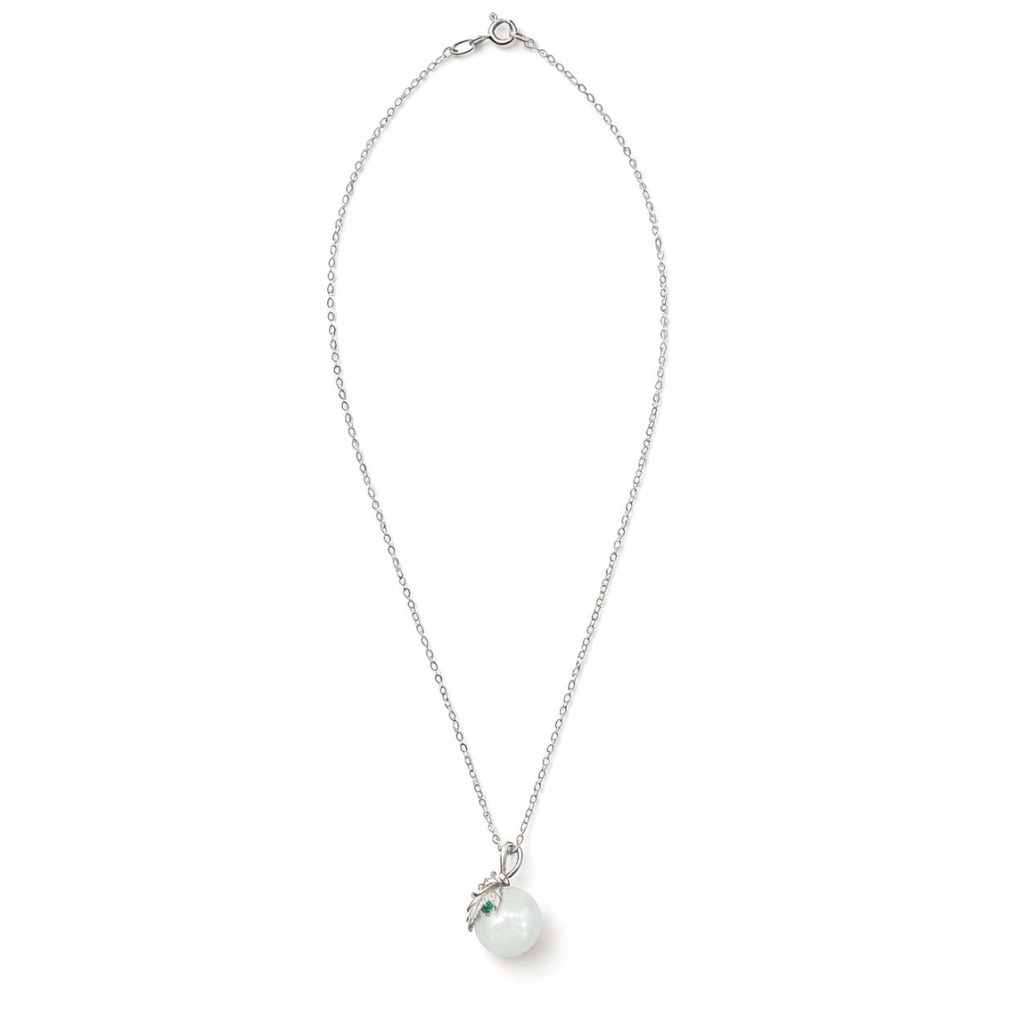 Full Flora necklace with a white nephrite jade sphere, sterling silver and green cubic zirconia.
