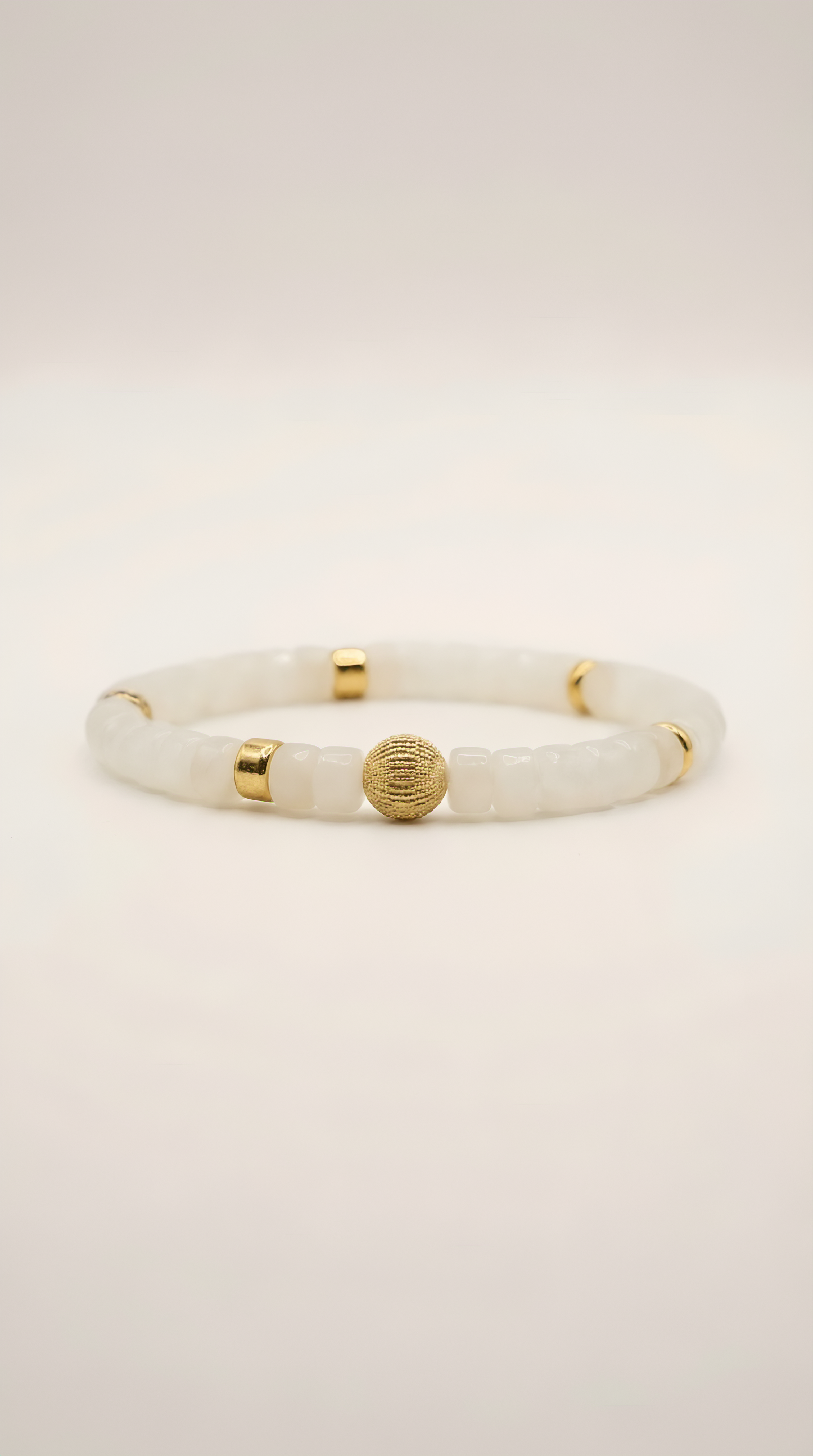 Handmade white jade bead bracelet close-up